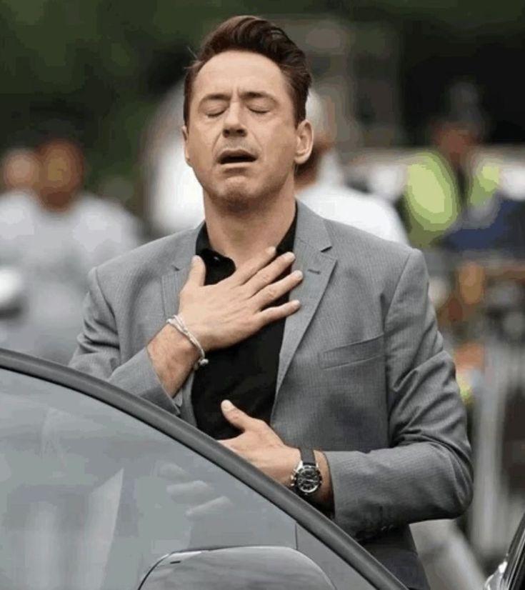 Man closing his eyes in deep relief